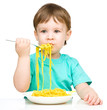 Foto: Little boy is eating spaghetti Little boy is eating spaghetti
