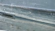 Hull of  boat cutting through water - Close Up