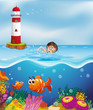 A boy swimming at the beach with a lighthouse