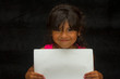 Girl with blank paper