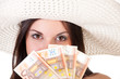 beautiful woman in summer dress with hat and money
