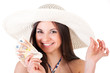 beautiful woman in summer dress with hat and money
