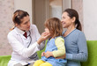pediatrician doctor examining baby