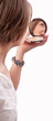 Reflection face of beautiful young woman in mirror