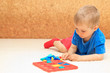 little boy learning shapes