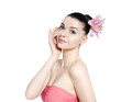Young beautiful brunette woman with flower