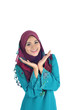 Young Muslim woman in head scarf with modern clothes