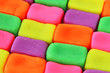 Wall background made of colorful child's play clay bricks