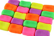 Pieces of wall made of colorful plasticine bricks