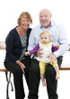 grandparents with granddaughter, isolated on white