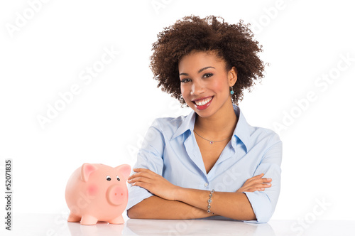 Photo: Saving Money With Piggybank Saving Money With Piggybank