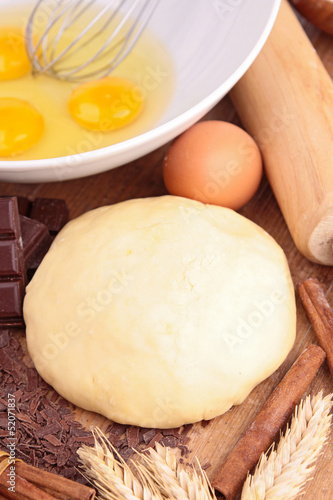 Photo: close up on baking ingredient and dough close up on baking ingredient and dough