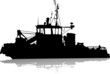 Silhouette of the sea towboat ship