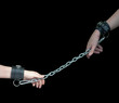 Hands Chained on Black