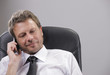 Photo: Business man on phone Business man on phone
