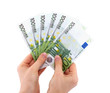 Hands holding a bunch of money isolated on white background