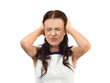 Young woman trying to block out a noise with her hands