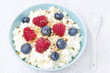 Photo: bowl of cottage cheese with berries, honey, nuts for breakfast bowl of cottage cheese with berries, honey, nuts for breakfast