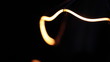 Real light bulb flickering. Macro.