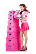 Young woman with storage boxes on white