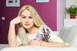 portrait of beautiful blond girl at home