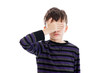 Photo: Boy covering his eyes isolated on white Boy covering his eyes isolated on white