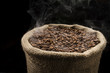 Sack full of still hot, freshly roasted coffee beans.