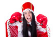 Businesswoman queen with boxing gloves