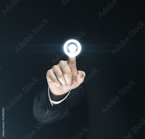 Photo: hand presses button hand presses button