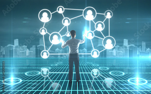 Photo: businessman pushing interface with social icons businessman pushing interface with social icons