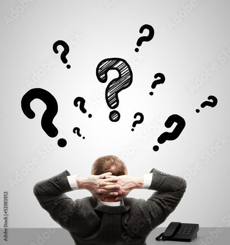 Photo: man sitting in office man sitting in office