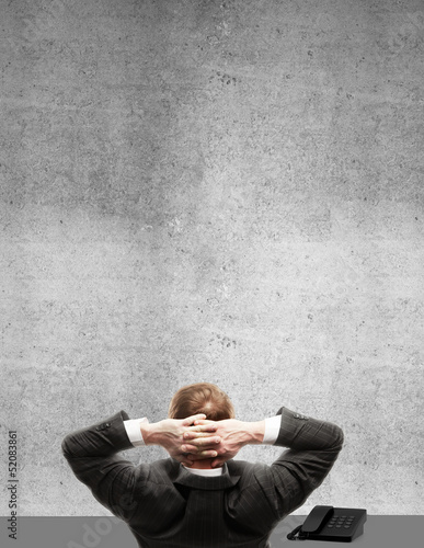Photo: man sitting man sitting