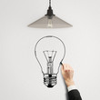Photo: hand drawing light bulb hand drawing light bulb