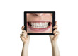 Foto: Dental closeup with tablet Dental closeup with tablet
