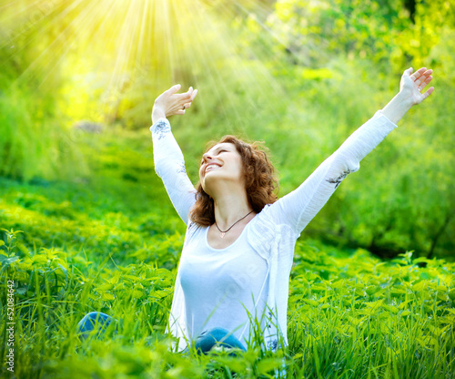 Photo: Beautiful Young Woman Outdoors. Enjoy Nature Beautiful Young Woman Outdoors. Enjoy Nature