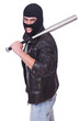 Male hooligan with bat on white