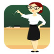 Teacher in a Classroom Writing on the Blackboard
