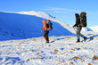 Winter hiking in the mountains on snowshoes.