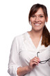 Portrait of smiling woman with glasses in her hands