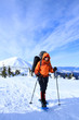 Winter hiking in the mountains on snowshoes.