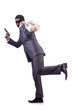 Gangster with bags of money on white