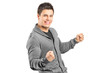 Foto: A young male gesturing happiness ands looking at camera A young male gesturing happiness ands looking at camera