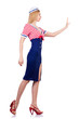 Woman in costume pushing virtual obstacle