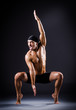 Dancer dancing in the dark studio