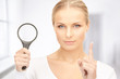 Photo: woman with magnifying glass woman with magnifying glass