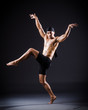 Dancer dancing in the dark studio