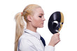 Foto: Woman with mask in hypocrisy concept Woman with mask in hypocrisy concept