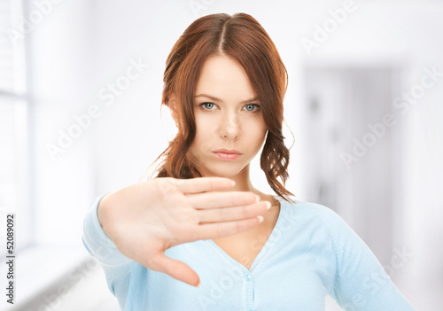 Photo: woman making stop gesture woman making stop gesture