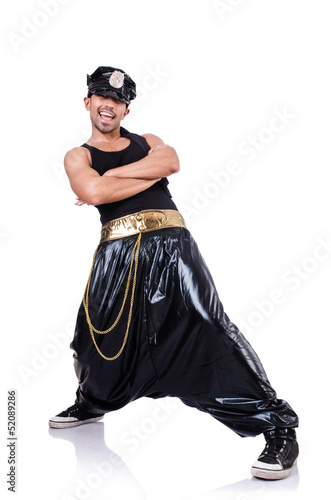Photo: Rap dancer in wide pants on white Rap dancer in wide pants on white