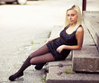 Photo: Girl is sitting Girl is sitting